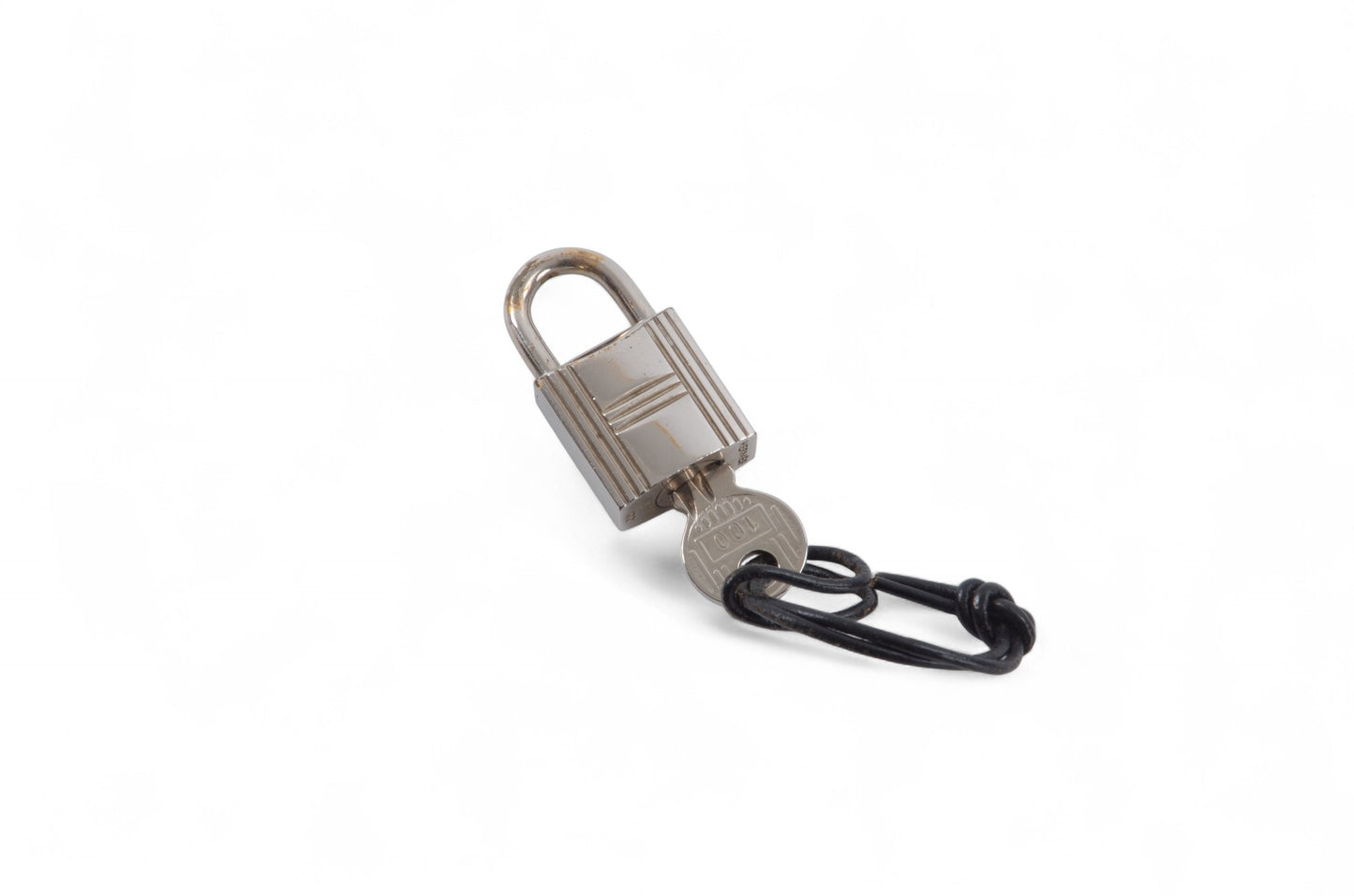 Hermès Silver Padlock Lock with Key Silver tone Brass Vintage Cadena Pendant Authentic Designer Classic Charm