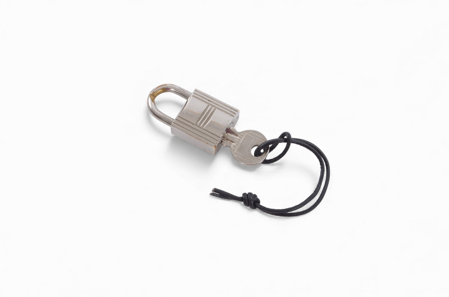 Hermès Silver Padlock Lock with Key Silver tone Brass Vintage Cadena Pendant Authentic Designer Classic Charm