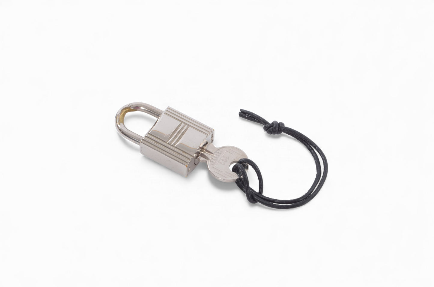 Hermès Silver Padlock Lock with Key Silver tone Brass Vintage Cadena Pendant Authentic Designer Classic Charm