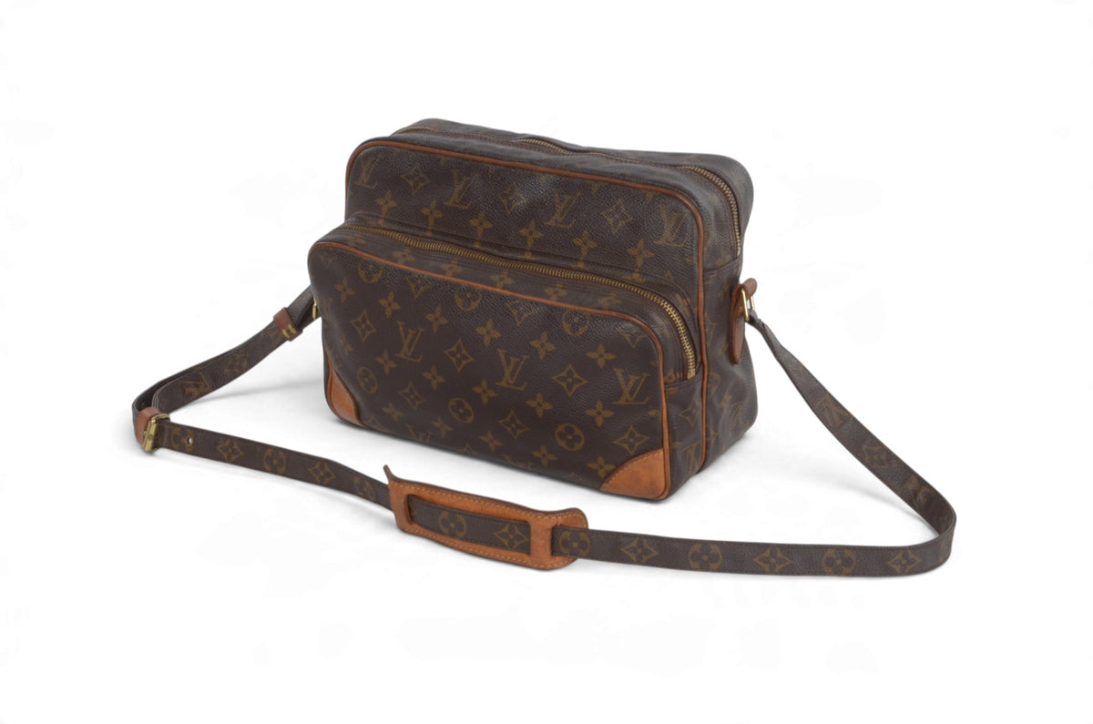 Louis Vuitton Nile vintage shoulder bag showing leather trim and Monogram canvas