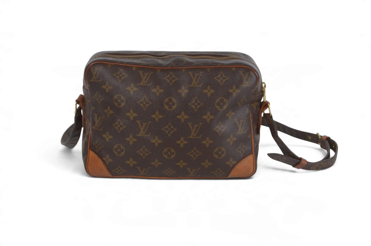 A Louis Vuitton monogram canvas shoulder bag in brown with tan leather trim and a dark brown leather strap, shown against a plain white background.