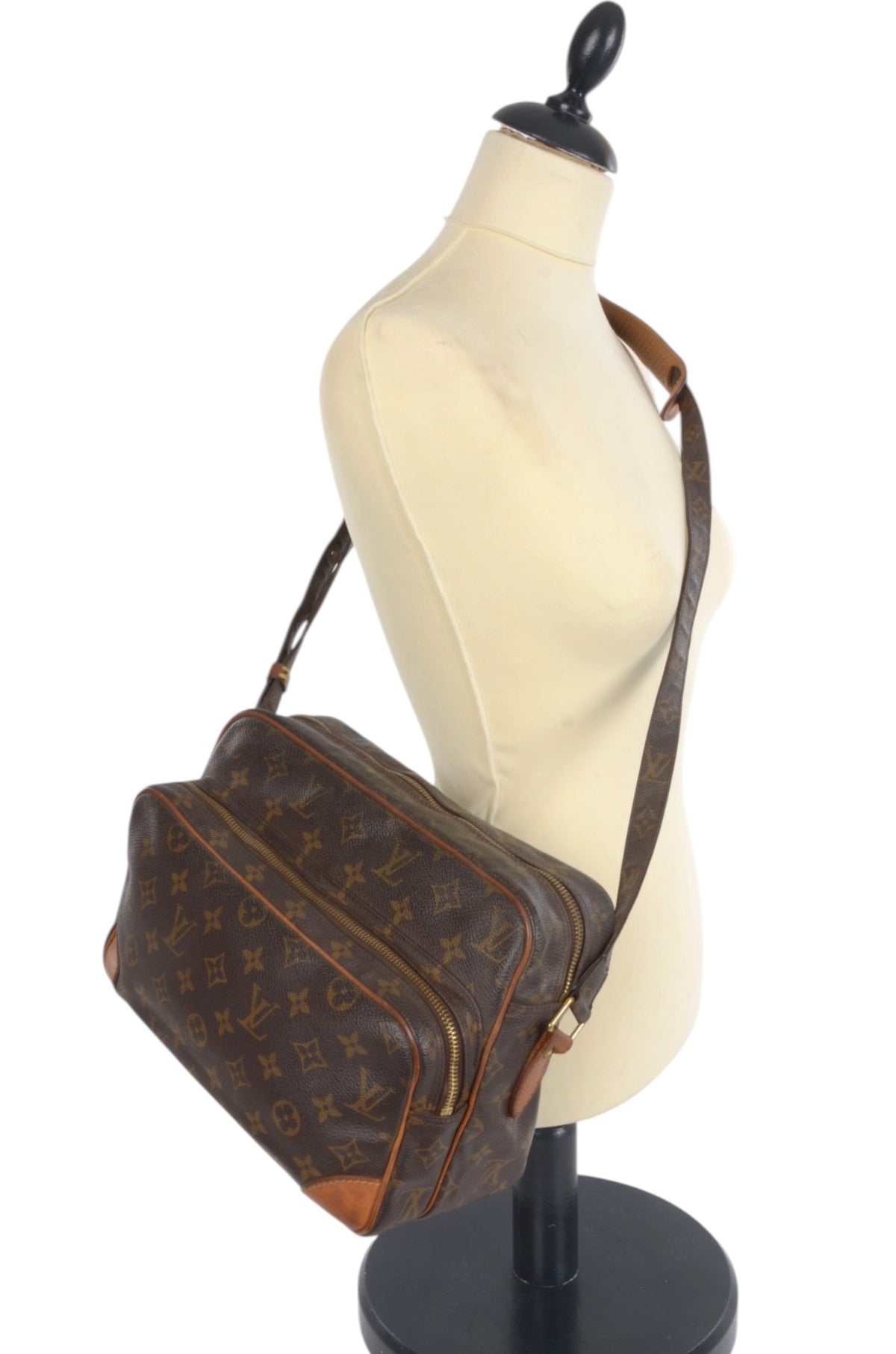 Louis Vuitton Nile vintage handbag showing corners and signs of wear