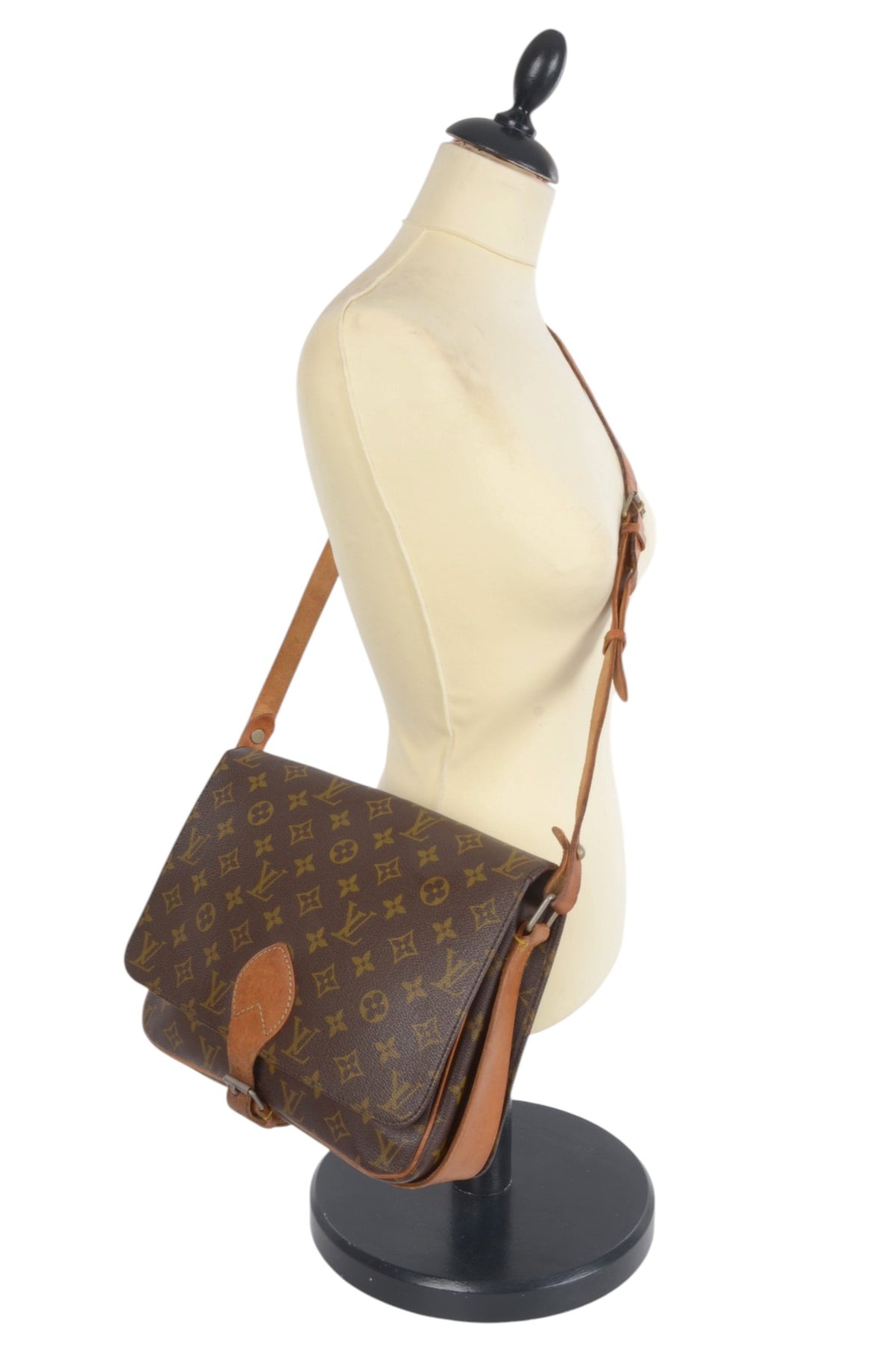 Louis Vuitton Cartouchière GM Monogram canvas bag showing leather trim and hardware