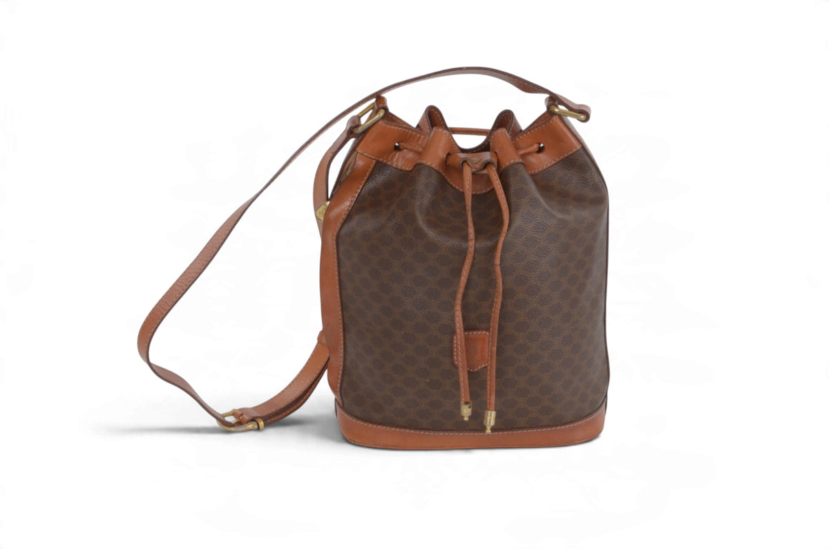 Vintage Celine Triomphe brown monogram canvas drawstring bucket shoulder bag front view