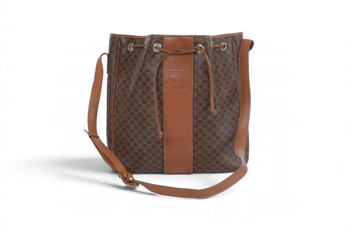 Vintage Celine Triomphe monogram brown canvas drawstring bucket shoulder bag front view