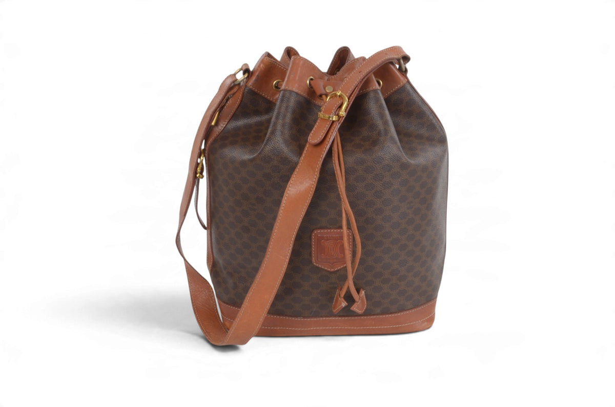 Vintage Celine Triomphe monogram brown canvas drawstring bucket shoulder bag front view