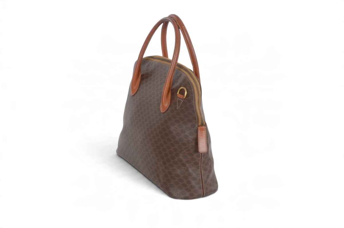 Celine vintage Triomphe tote bag close-up of leather handles and monogram canvas