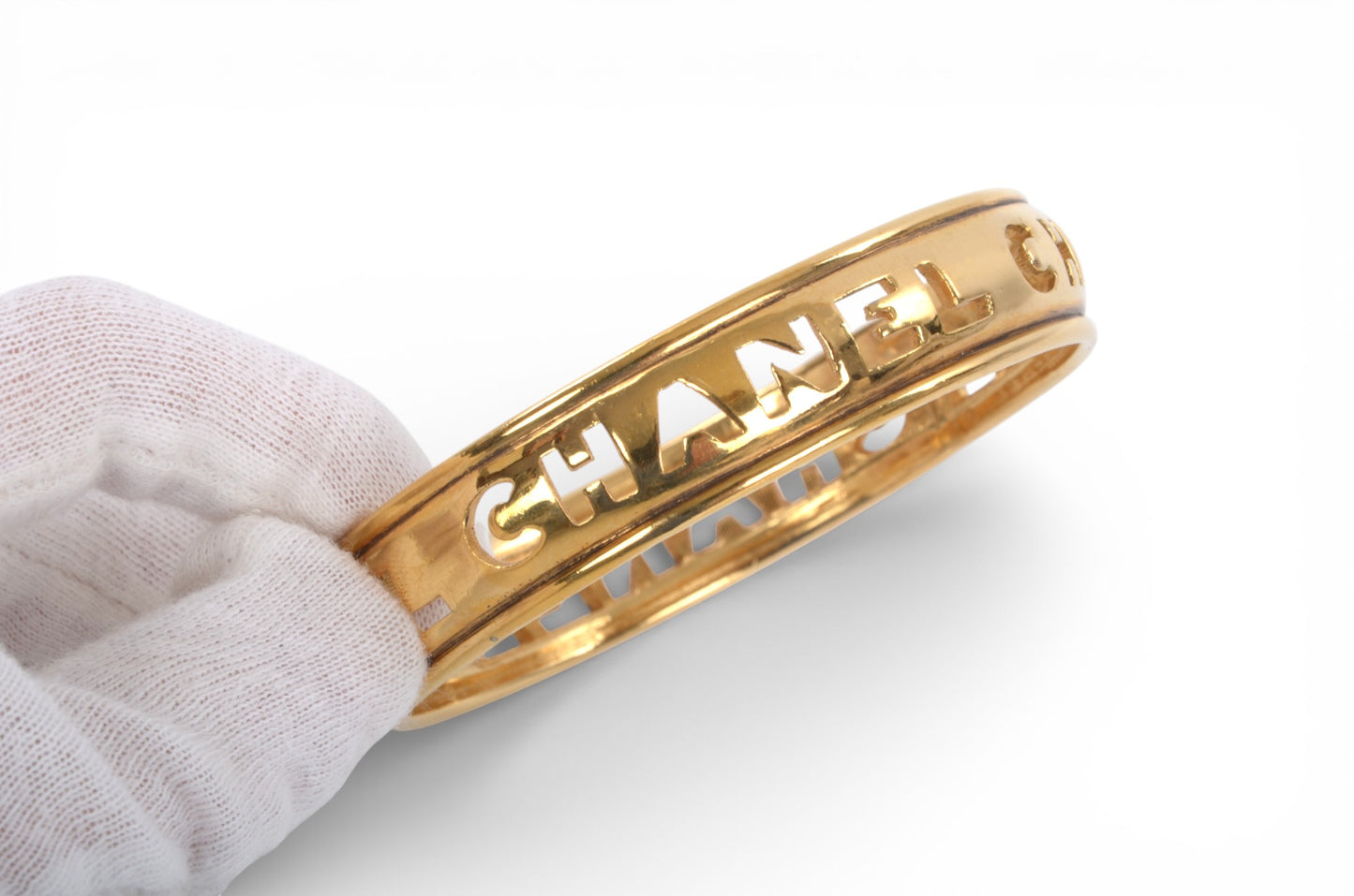 Chanel Gold Plated Cut Out Logo Bangle Bracelet 1980's Vintage Cuff Designer Classic