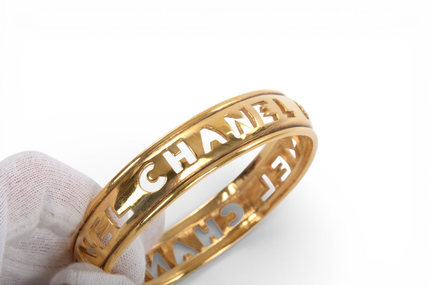 Chanel Gold Plated Cut Out Logo Bangle Bracelet 1980's Vintage Cuff Designer Classic