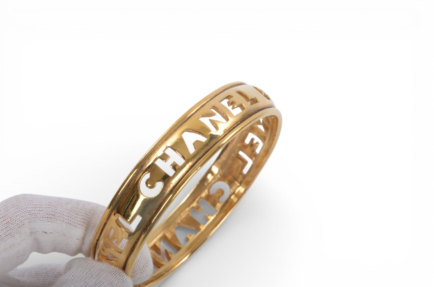 Chanel Gold Plated Cut Out Logo Bangle Bracelet 1980's Vintage Cuff Designer Classic