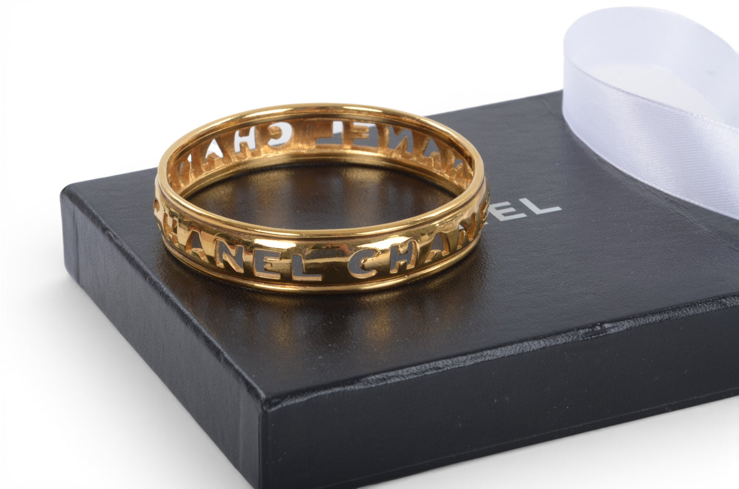 Chanel Gold Plated Cut Out Logo Bangle Bracelet 1980's Vintage Cuff Designer Classic